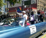 My daughter marching with Ugandan Bishop Senyonjo, San Francisco Pride
