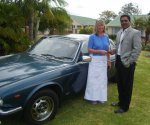 Suzanne Bundy gives Errol Naidoo a gift of a car