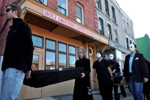 Coffins Outside Scott Lively's coffee shop Where Preaching of Hate is a daily tool